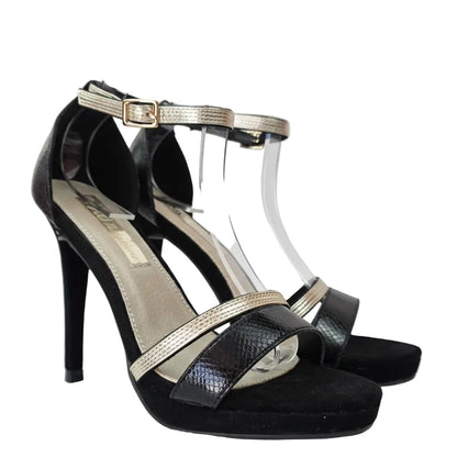 Sandalia de Tacón Xti Negra con Detalles Oro y Textura Animal – Pasarela Concept