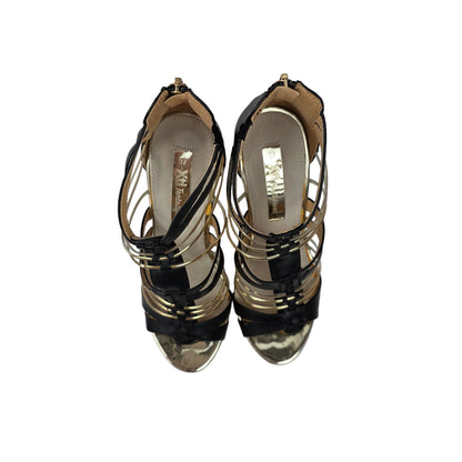 Sandalias de Cuña Xti Negras y Oro con Diseño de Tiras y Corcho – Pasarela Concept